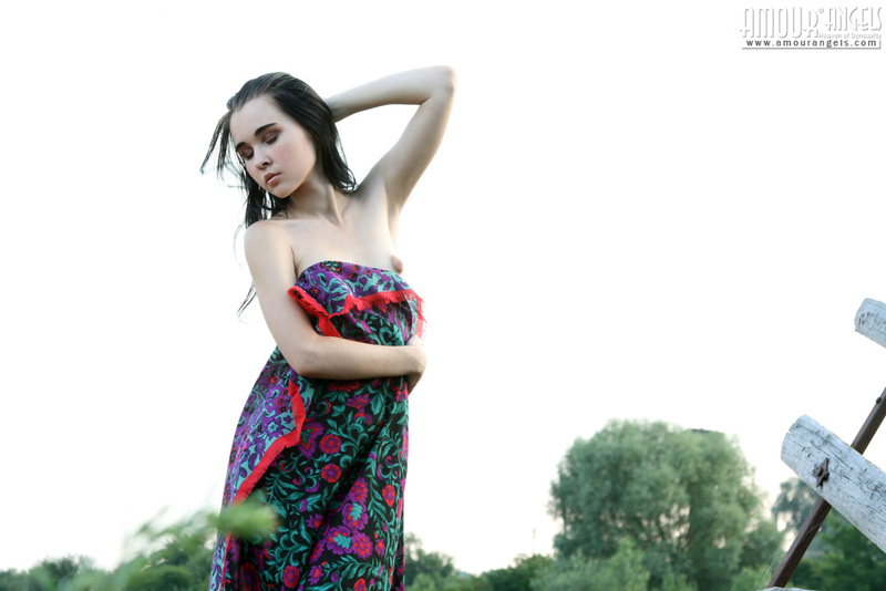 Small titted teen posing outdoor 01